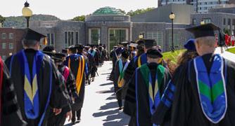 Image of procession entering ceremony site.